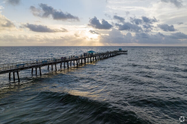 Go fishing out on the pier in Lauderdale-by-the-Sea.