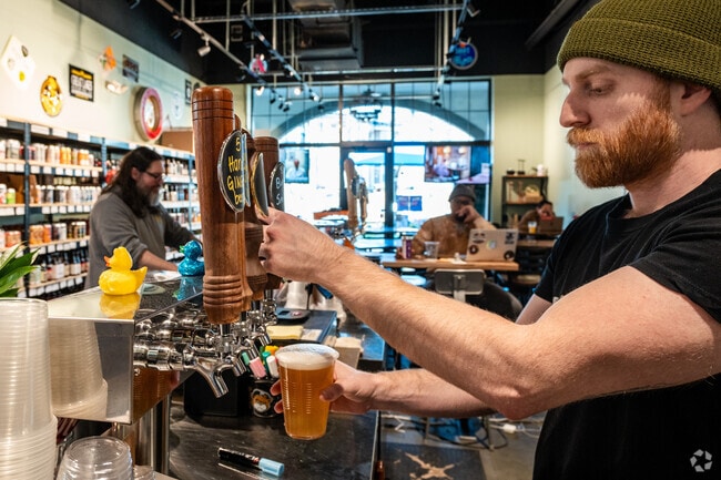 House Creek Beverage Company has a large selection of local craft beer on tap.