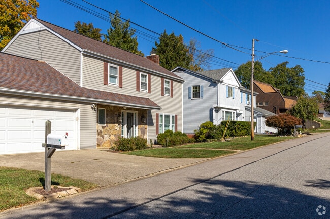 A row of Colonial Revival and traditional homes in Huntington's Southern Hills neighborhood.