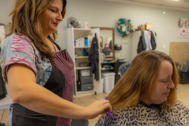 Schedule a cut and color at Split Endz in Country Aire Estates.