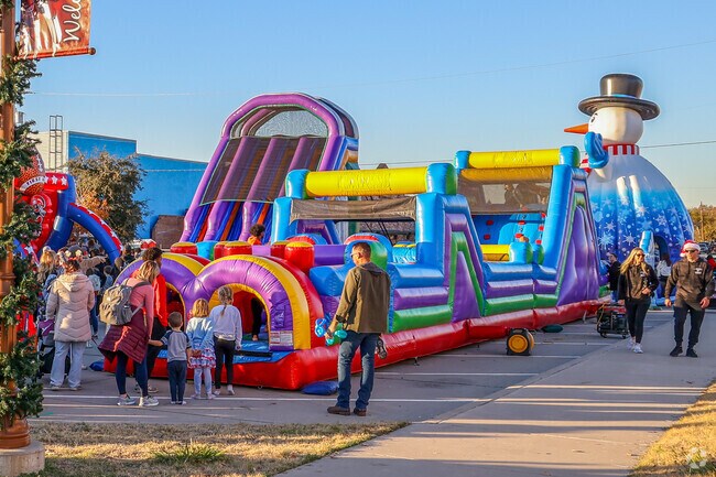 Adults and kids will love going on the slides at the Prosper Christmas Festival.