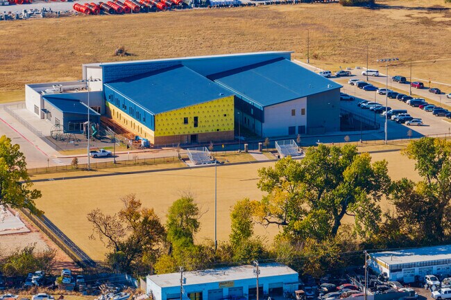 Here is an aerial view of Astec Charter Elementary School with the field