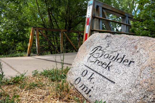 Boulder Creek offers serene water views and lush green surroundings in Boulder.