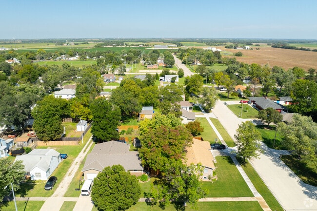 Tree-lined streets wind through Hillsboro neighborhoods with cozy residential homes.