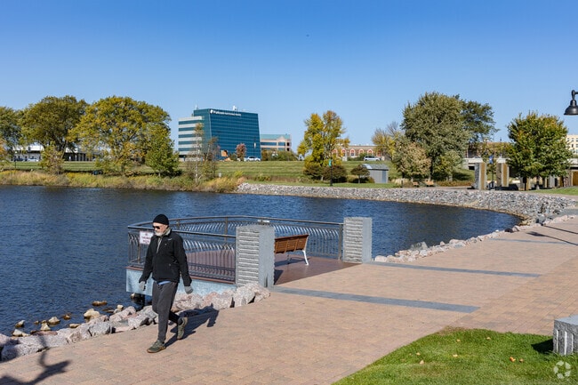 Walking paths encircle Lake George for scenic views at Lake George Park.