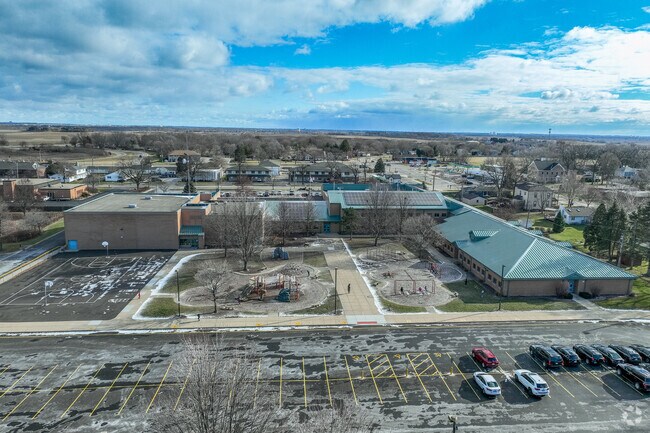 Kaneland Elementary School has a small playground that backs up to Volunteer Park.