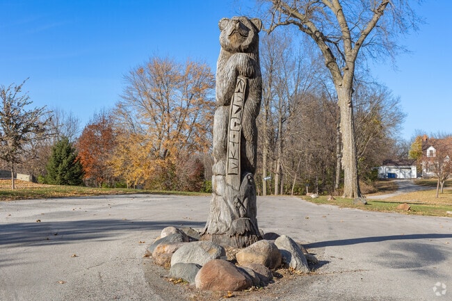 In Vinton, decorative welcome signs may feature bears and little squirrels.