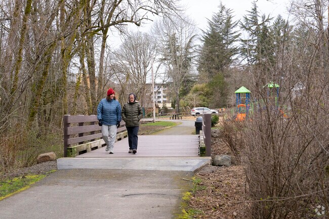 Enjoy the relaxing walking paths with sounds of a trickling creek at McMillian Park.
