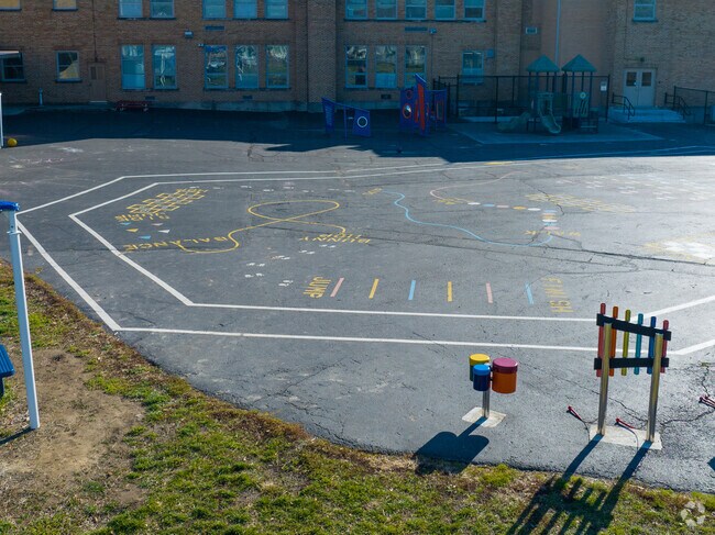 The students enjoy playing outside for recess.