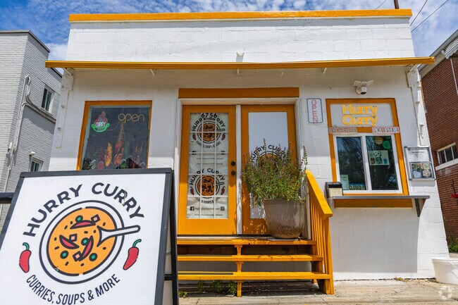 Curry bento boxes and naan grilled cheeses are ordered to go at Hurry Curry in Madison Place.