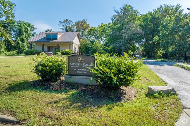 Lake Olmstead Trailhead is a half-mile paved trail along the water on the edge of the West End.