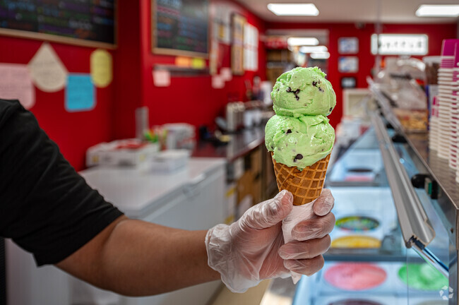 Two scoops of mint chocolate chip is served up at Roll and Scoop near the Lowber neighborhood.