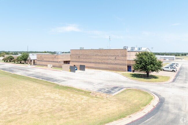 Tolar High School’s entrance is framed by greenery, offering a welcoming start to school.