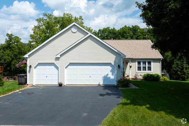Traditional homes come complete with large garages and driveways.