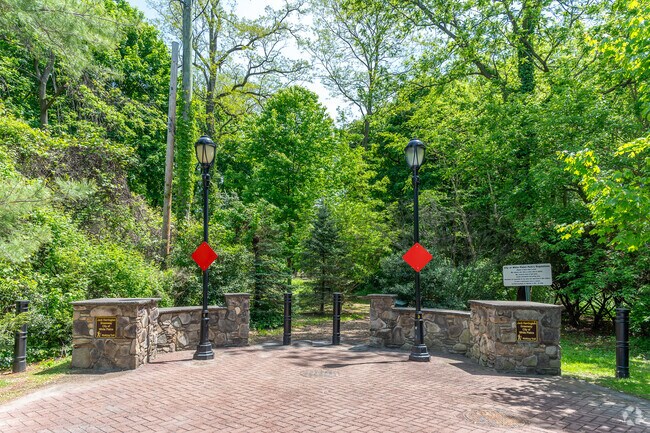 The Jack Harrington Greenway in White Plains spans approximately 1.4 miles and features a well-maintained woodchip surface ideal for walking and running.