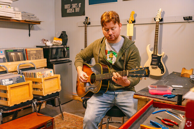 At Guitars and Grooves, residents of Berlin can fine tune your guitar skills.