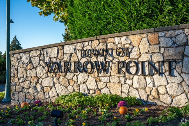 The Yarrow Point town sign marks this scenic lakeside community.
