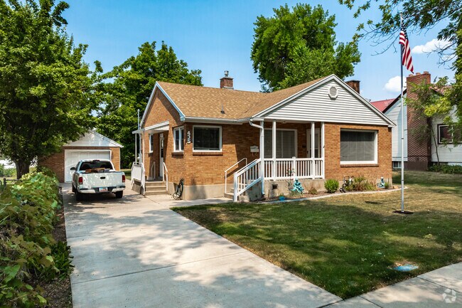 Adams has brick bungalows with detached garages.