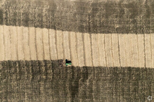 Harvest patterns stripe the fields that surround Paris, Wisconsin.