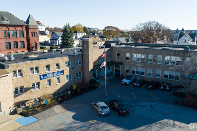 Venerini Academy's main entrance is located in the inner section of the building.