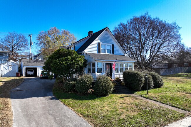 An American flag hangs by the front door of this residential home in Alcoa, TN.