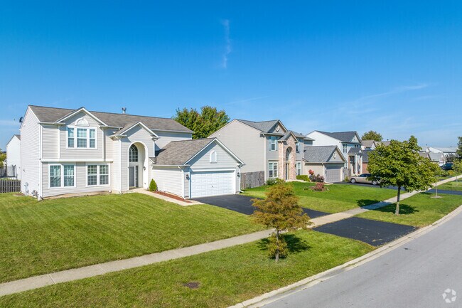 A beautiful row of homes showcasing popular home styles of Lily Cache.
