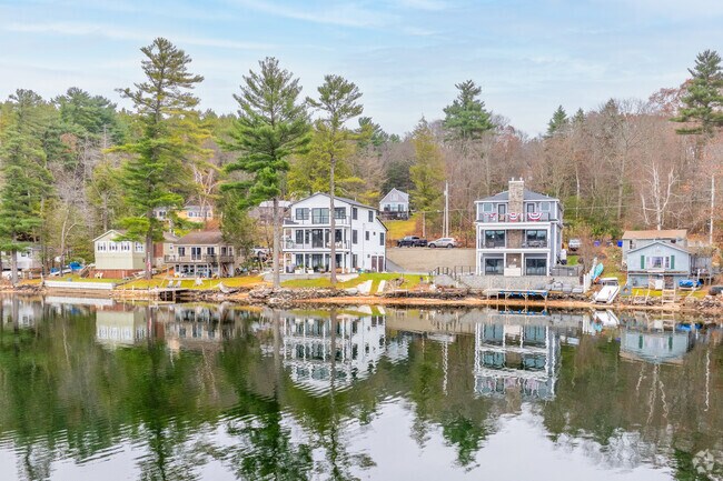Homes along Wash Pond provide scenic views and direct access to the water, making them highly desirable properties.