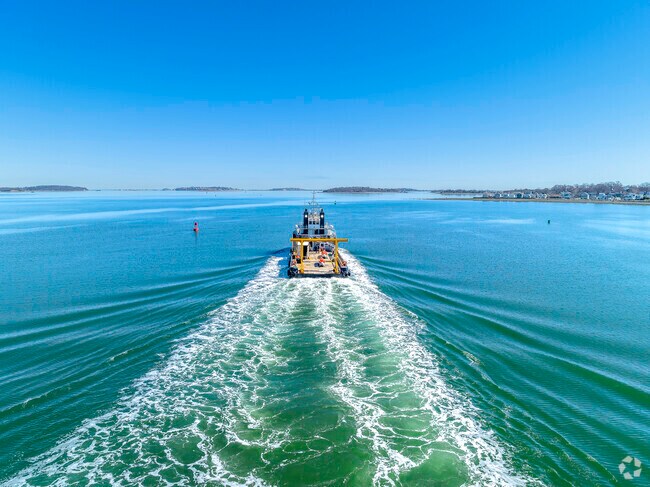 A Boat Heads Out On Weymouth Fore River