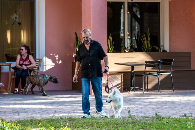Venetian Bay residents love to bring their pets out on the town square.