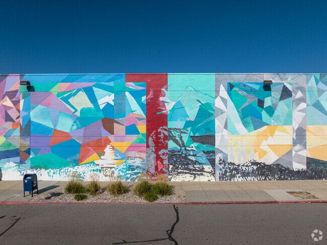Thus colorful moral of mountains at South Town mall is made of geometric shapes.
