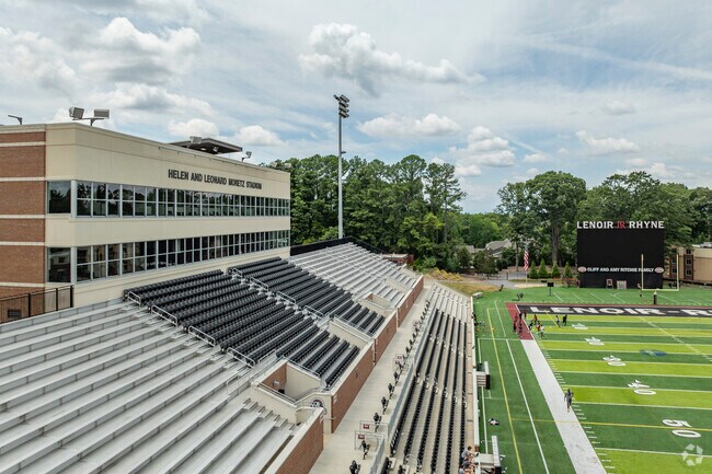 The Lenoir-Rhyne University stadium fills with locals for home games near Ridgeview.