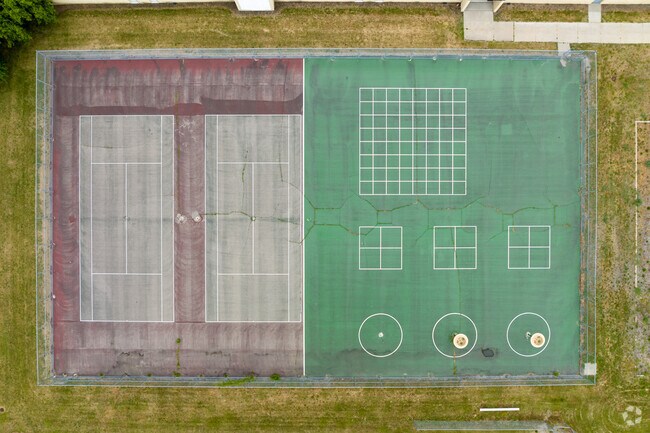 Aerial view at 90-degrees of Marshall Upper Elementary School tennis and sports courts.