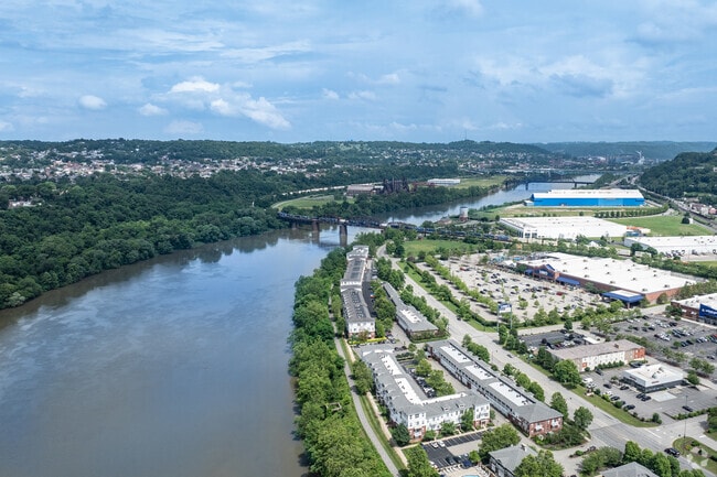 The Monongahela River passes by the city of Munhall.