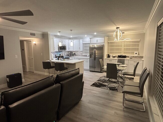 Large Open floor plan includes Electric reclining modular sofa with lounger