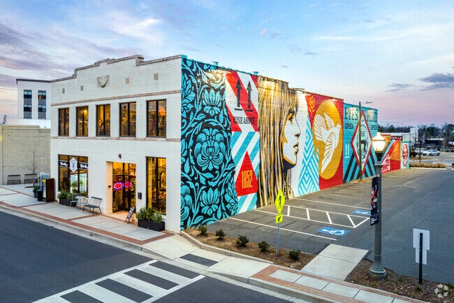 When the sun begins to set, the vibrancy of downtown Rock Hill murals begins to pop out more.