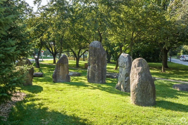 Unkefer Park in Rosemont features a unique stone sculpture and green spaces.