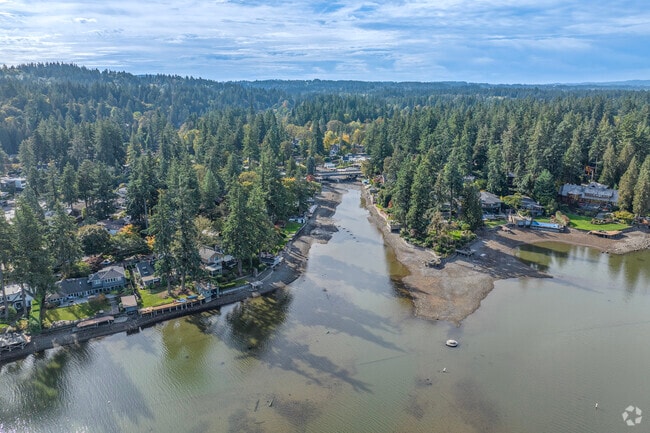 The Oswego Canal winds through Blue Heron, creating a picturesque waterfront backdrop for luxury homes and offering direct lake access.
