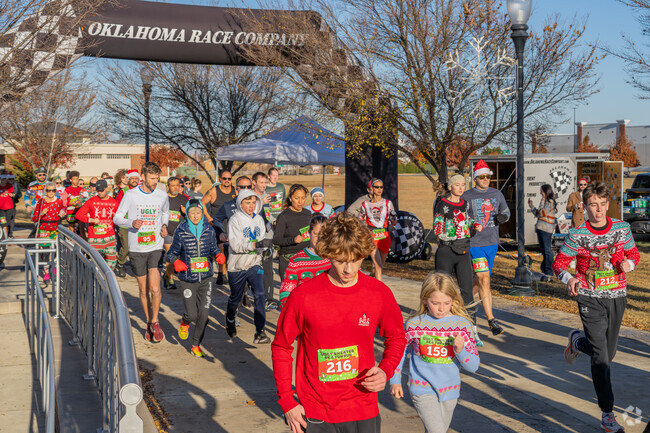 Southeast Norman residents enjoy the festive Ugly Sweater Run event.