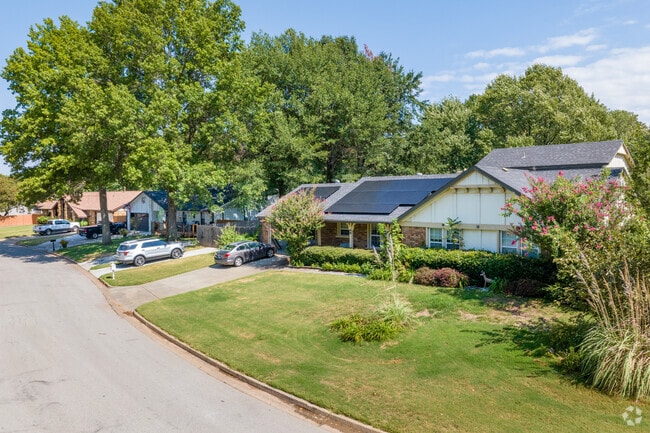 Inviting residential neighborhoods adorned with trees in Sheridan Valley.