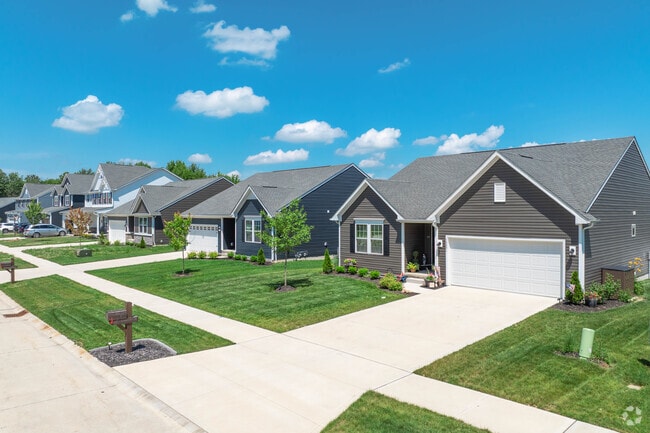 A row of cookie cutter ranches lines one of Middlefield's newer developments.
