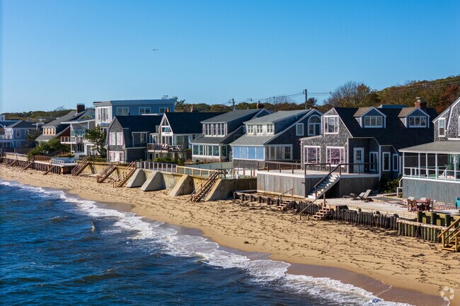 Provincetown homes stretch toward the Atlantic along Cape Cod’s coast.