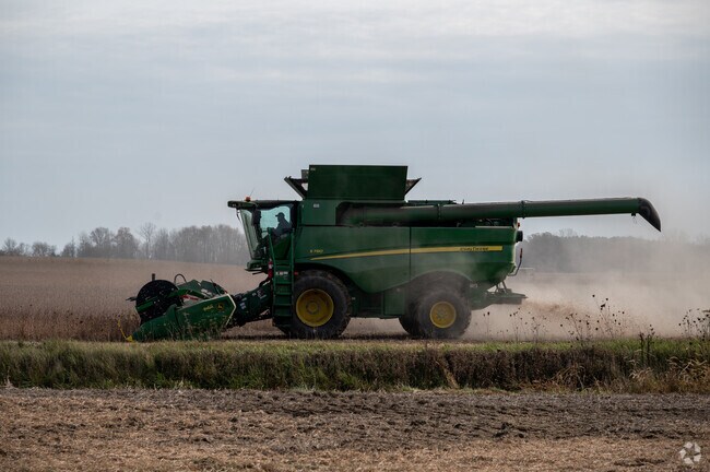 Farm equipment in use during the fall harvest in Burlington Township.