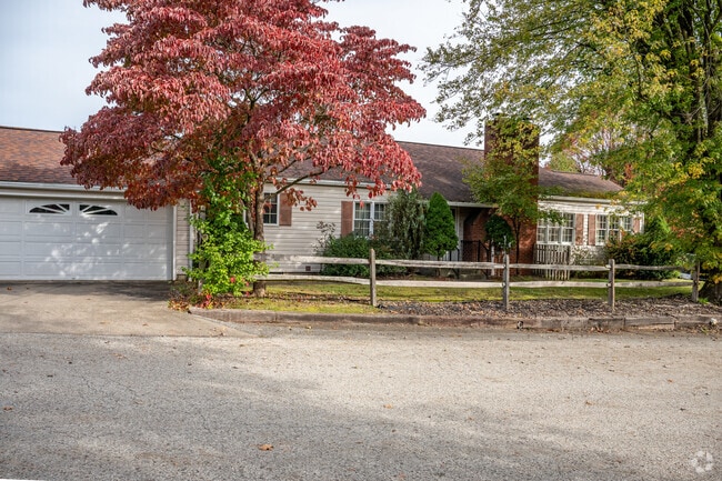Quaint ranch homes sit in the trees of Manor Township Armstrong.