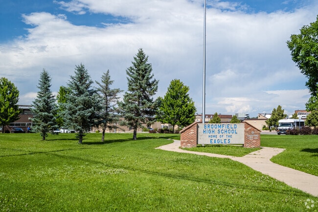 The school sign and entrance walkway at Broomfield High School in Broomfield, Colorado.