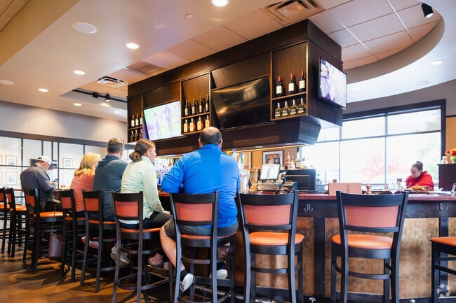 Grab a drink and an appetizer at the bar in 110 Grill in Northeast Nashua, NH.