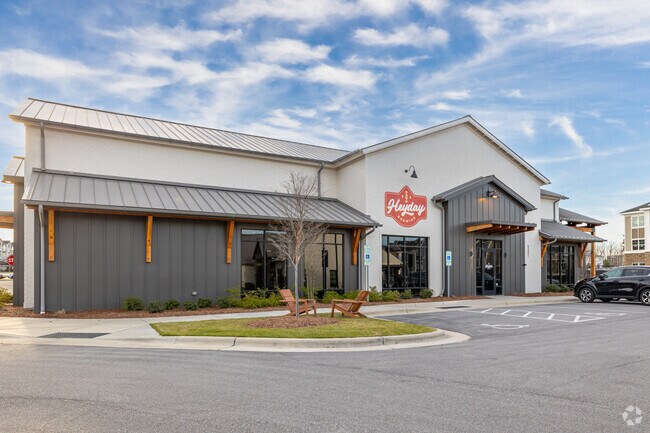 Forestville's Heyday Brewing stands out in Tin Roof Way with its industrial façade and outdoor seating.