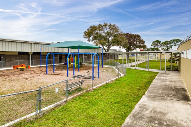 A fenced in playground is perfect for younger students of Turner Elementary School to play.