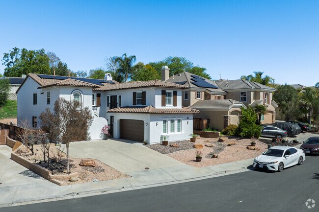 A row of Spanish-style and Mediterranean homes lines a quiet street in Alta Vista.