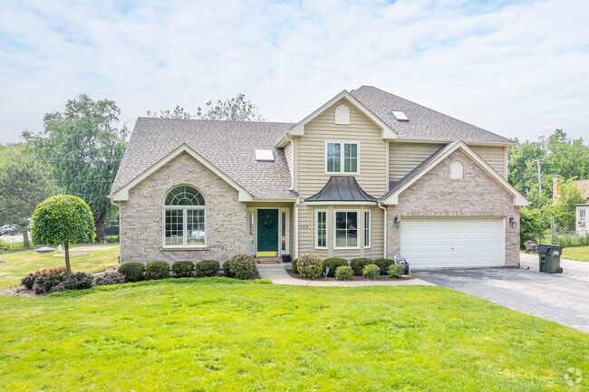 Newly built homes in York Center blend a mix of styles including Tudor home style.