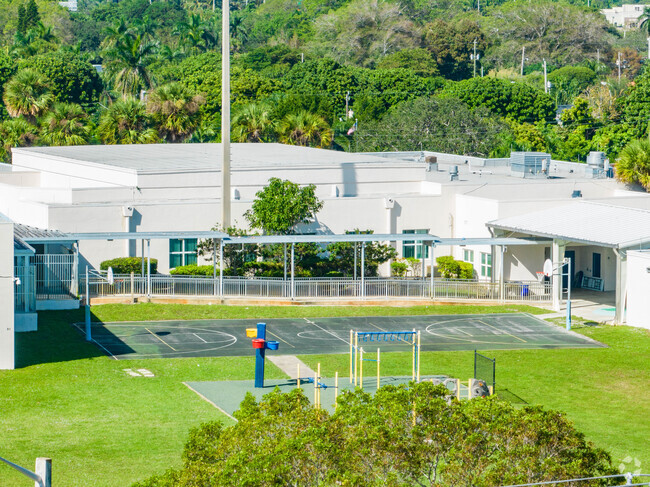 The basketball court and playground for the students at Palmetto elementary.